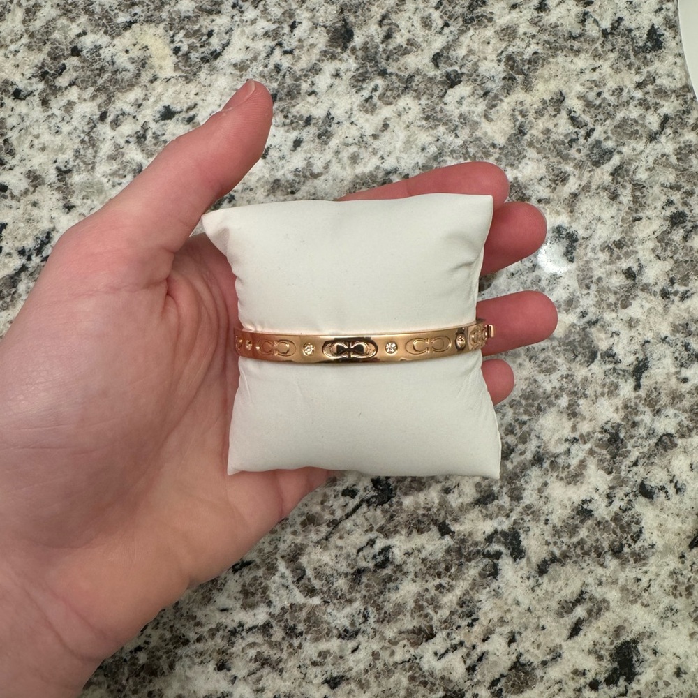 Rose gold coach bangle